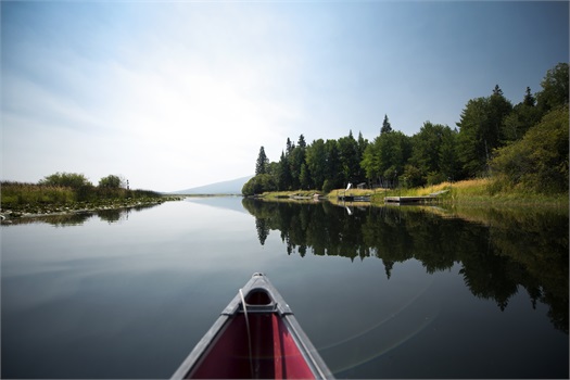 canoe floating on lake